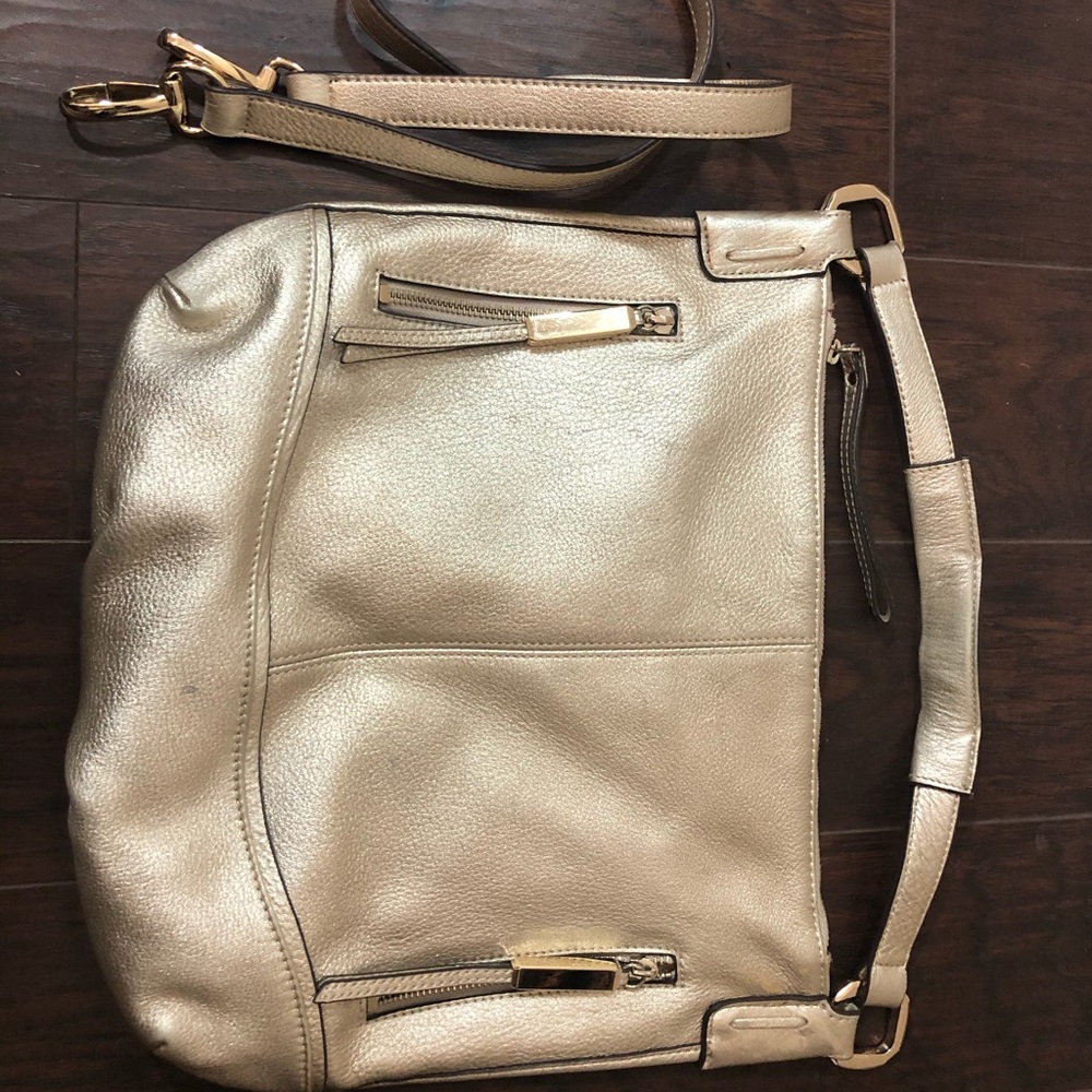 Beautiful light gold hand bag with shoulder strap